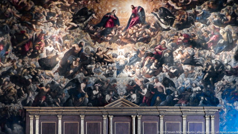 Close view of Tintoretto’s Paradise, with densely tiered celestial figures above the dais of the Great Council Chamber.