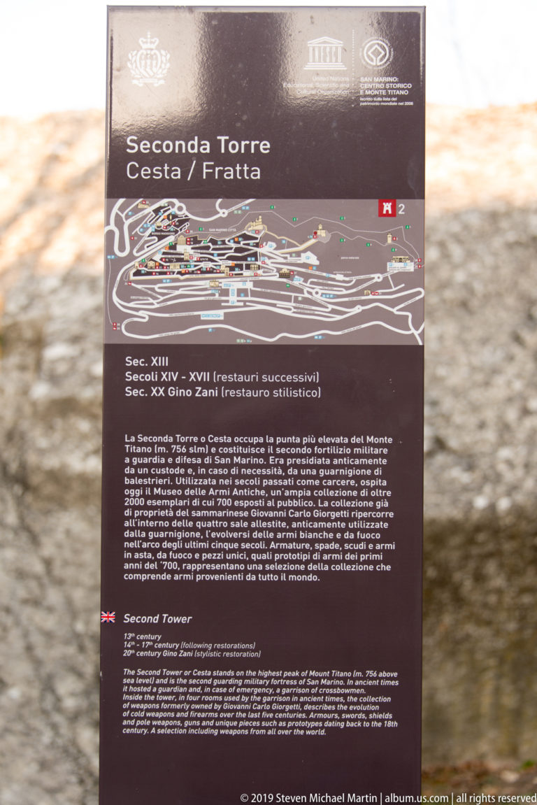 Interpretive sign headed Second Tower and Cesta / Fratta with a site map and bilingual historical text.