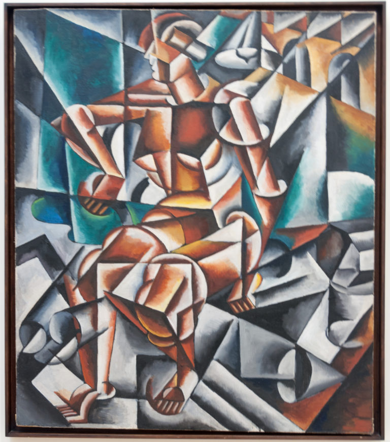 Framed modernist painting with fragmented human figures built from angular red, black, gray, white, and green planes.