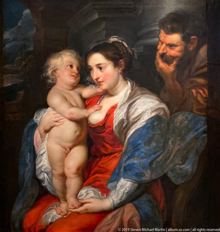 Holy Family painting with the Virgin Mary holding the Christ Child and Saint Joseph at right, displayed in La Venaria Reale’s Annunciazione e Natività exhibition.