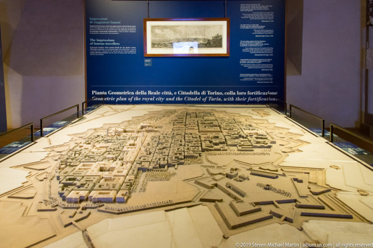 Relief model of Turin and its fortified citadel with dense city blocks, bastions, and geometric defensive works.