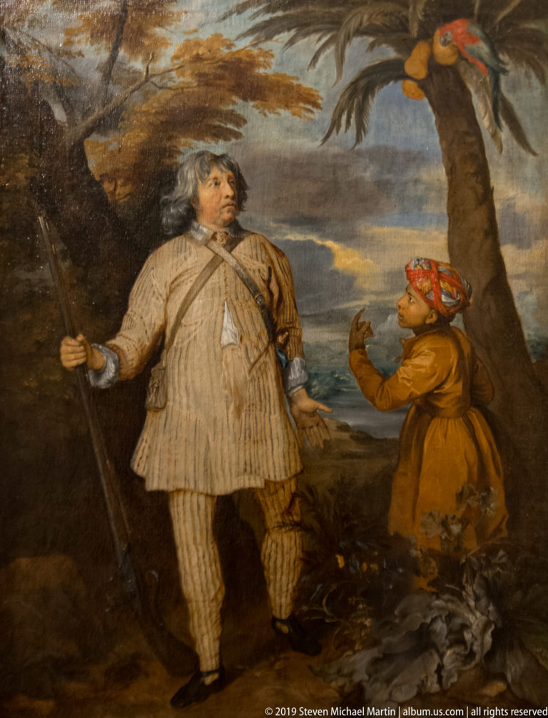 Painting of two men in contrasting historical or exoticized dress standing beneath a palm tree in a landscape.