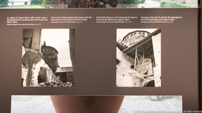 Museum panel with two archival photographs showing rubble, scaffolding, and reconstruction beside the tribune of Santa Maria delle Grazie.