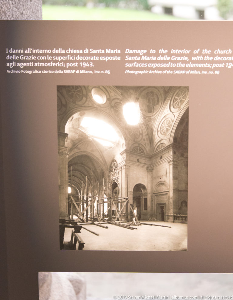 Archival interior of Santa Maria delle Grazie after bombing, with damaged roof, decorated vaults, debris, and temporary supports.