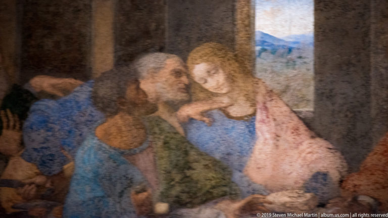 Peter leans toward the youthful John while Judas sits lower in the foreground in Leonardo’s The Last Supper.