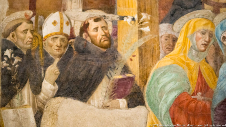 Dominican friars, a mitred prelate, and a mourning woman grouped in a detail of Montorfano’s Crucifixion.