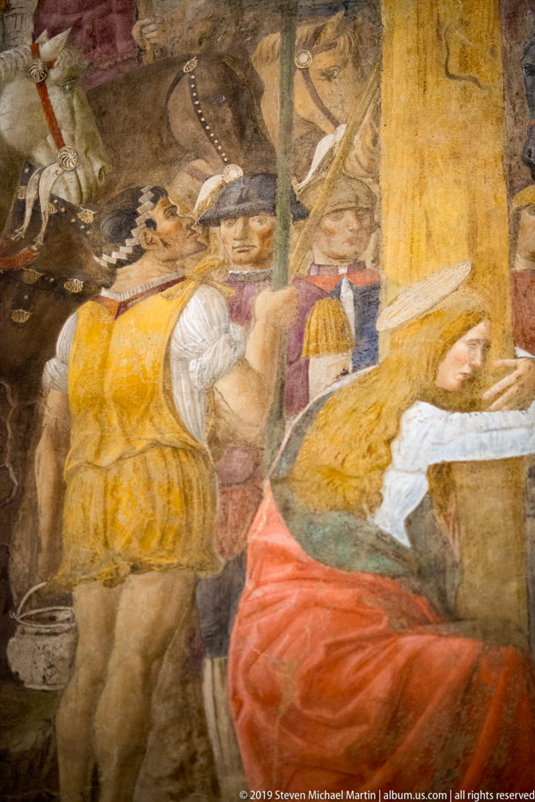 Detail of Montorfano’s Crucifixion with crowded soldiers and attendants, spears and staffs, and foreground figures in yellow and red.