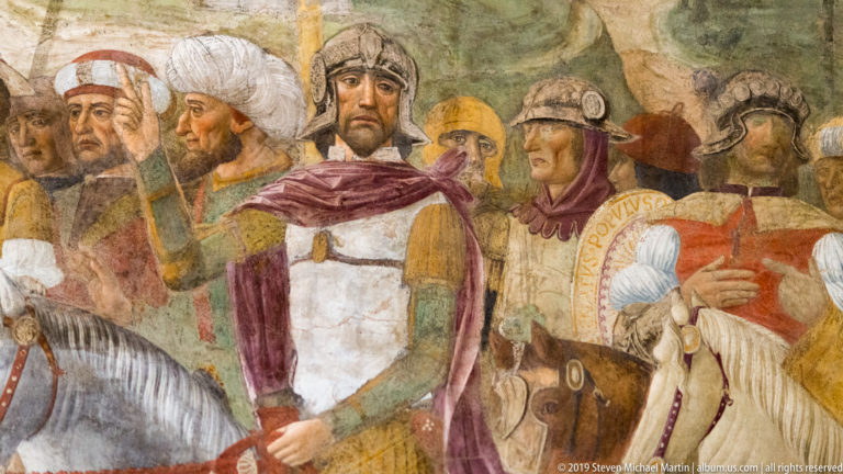 Detail of Montorfano’s Crucifixion with armored mounted soldiers, helmets, lances, horses, and richly colored late-15th-century clothing.