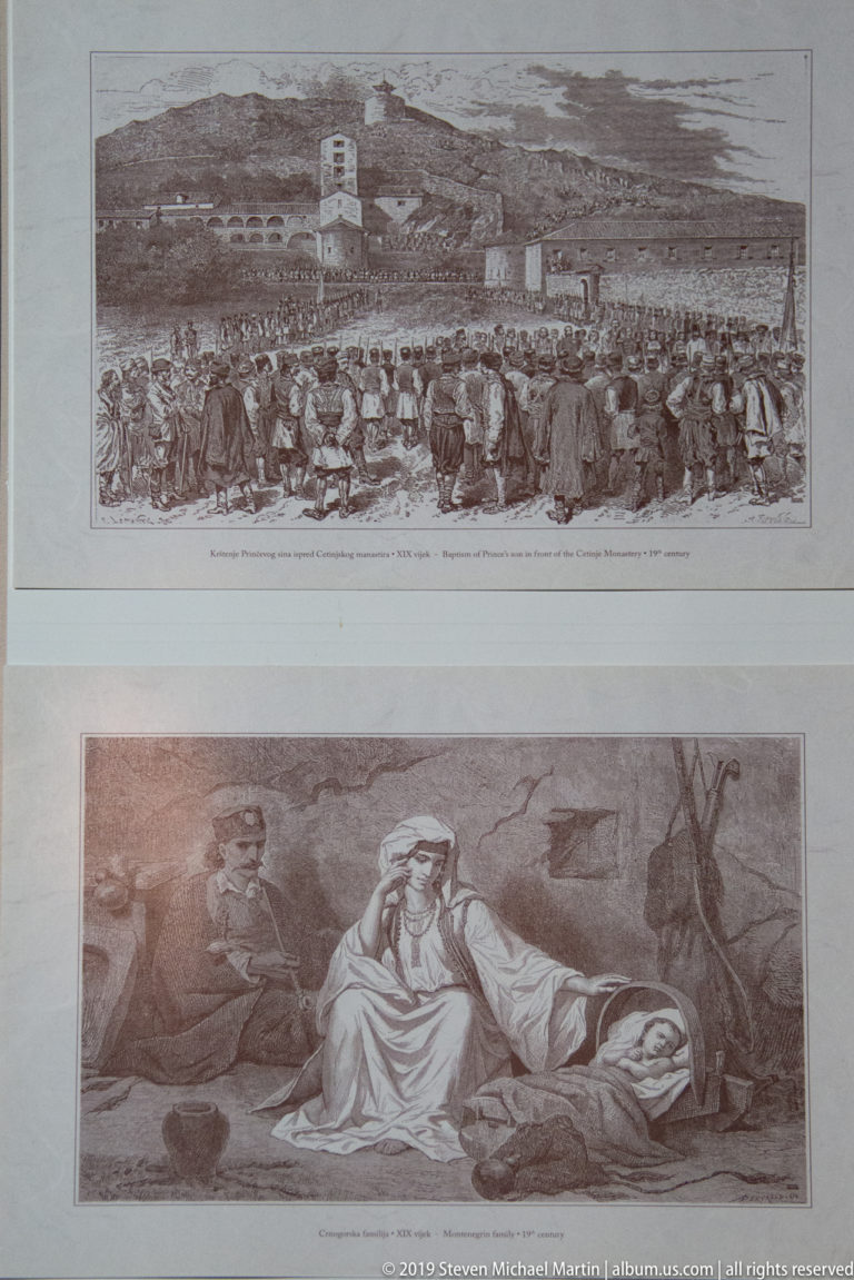 Two framed historical prints, one showing a large outdoor crowd and the other reclining figures in traditional dress.