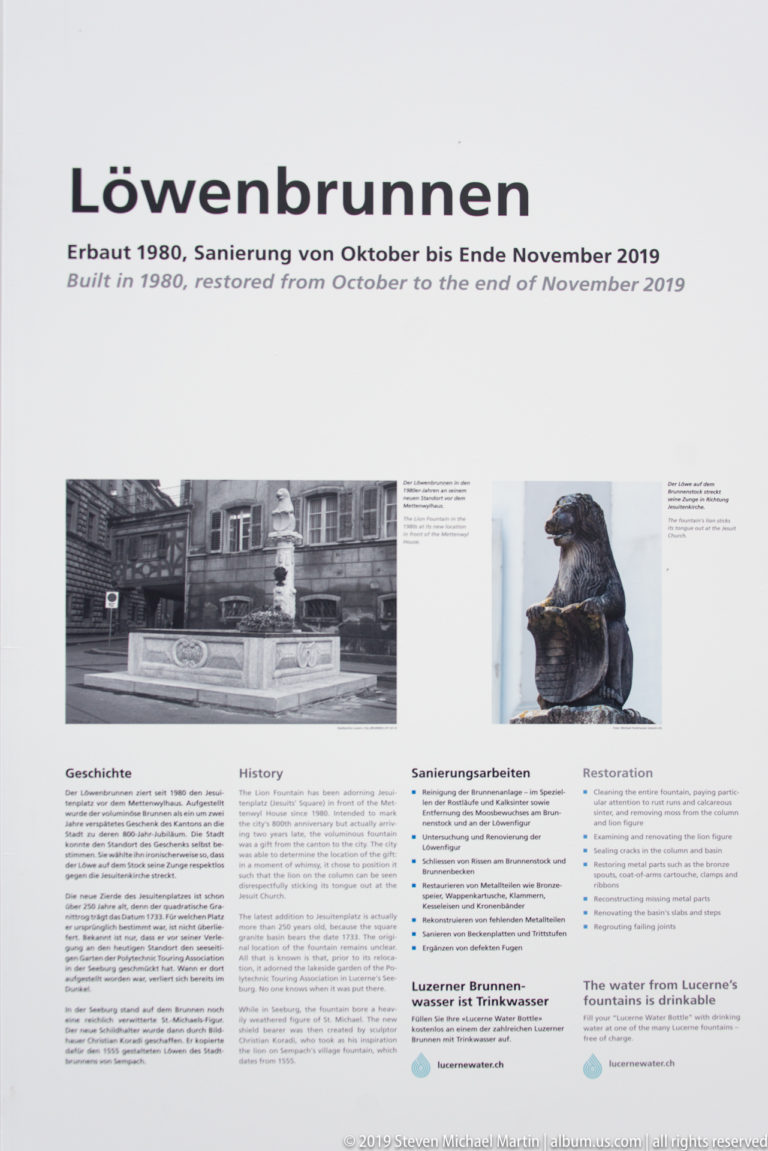 Information panel titled Löwenbrunnen with historic photos, restoration text, and an image of the fountain sculpture.