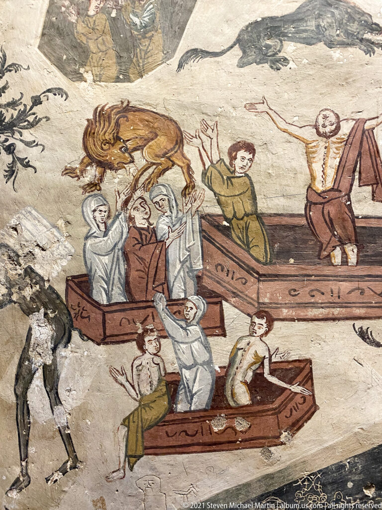 Fresco detail with figures rising among small boats and large sea creatures in a Last Judgment scene.