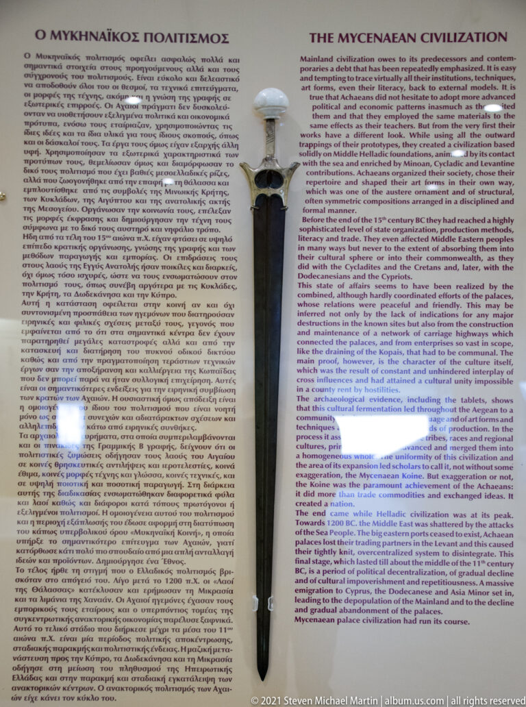 Bilingual museum panel titled “The Mycenaean Civilization,” filled with Greek and English explanatory text.