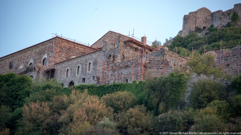 Palace of the Despots at Mystras with conservation scaffolding and the summit fortress rising behind.