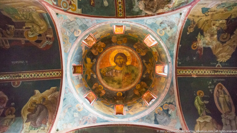 Christ Pantocrator painted in a circular dome, surrounded by saints and biblical figures in Panagia Kapnikarea.