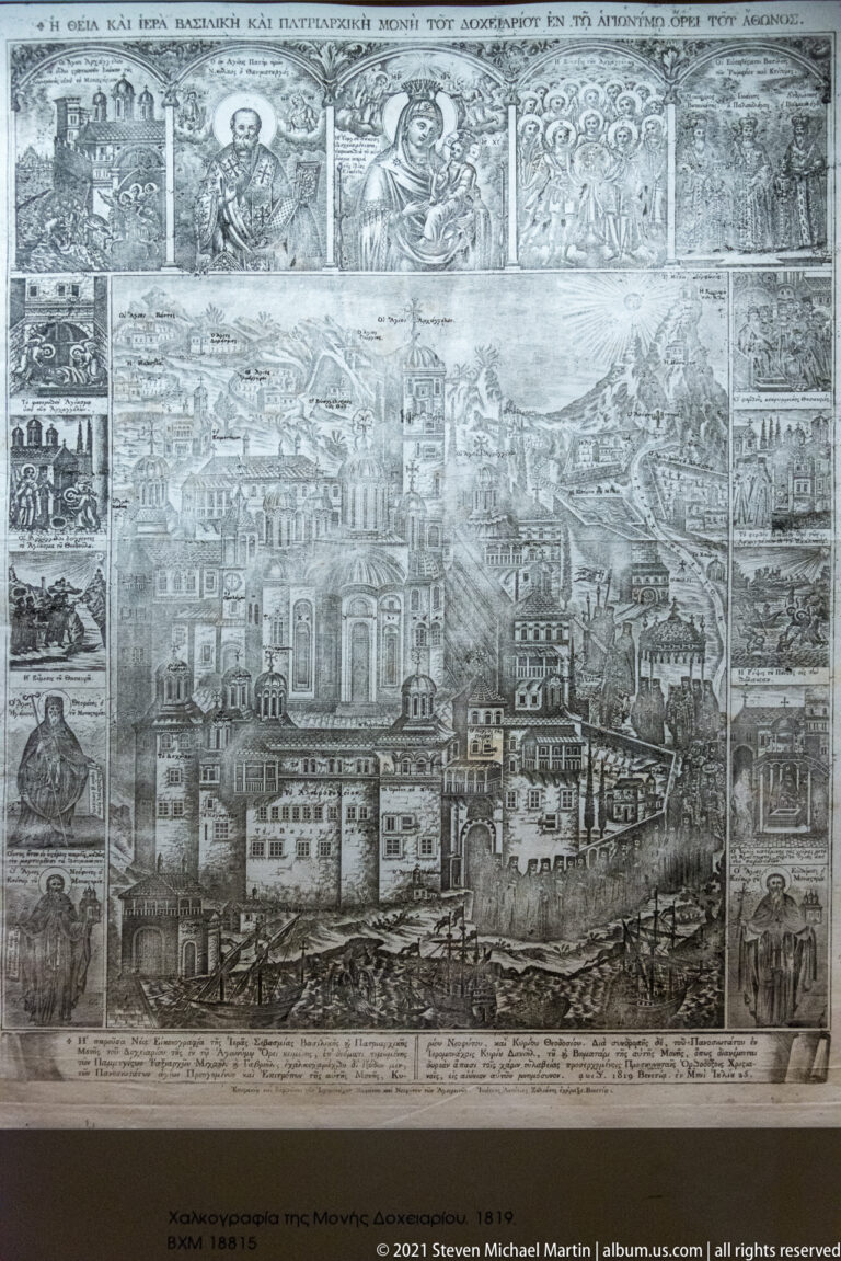 Large monochrome engraving of a fortified monastic complex in a mountainous landscape, bordered by smaller scenes and Greek inscriptions.