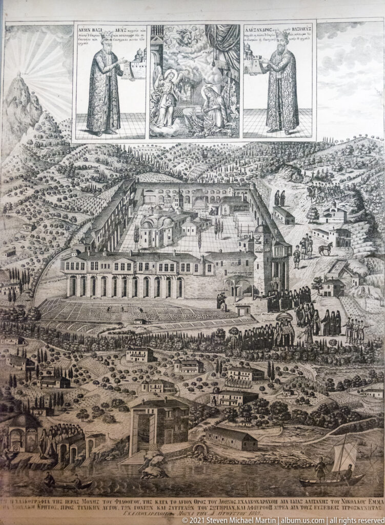 Bird’s-eye engraving of a large walled monastic compound with central church, courtyards, surrounding fields, roads, people, and upper vignettes.