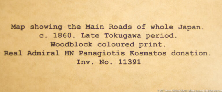 Museum label reading 'Map showing the Main Roads of whole Japan,' circa 1860, late Tokugawa period, colored woodblock print.