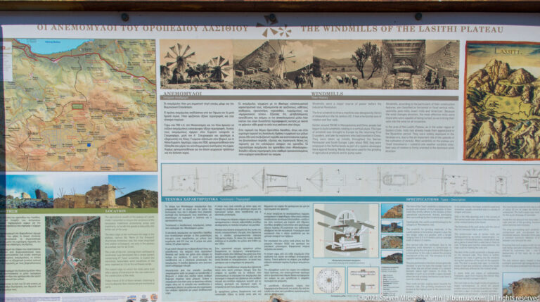 Museum-style interpretive panel with maps, historic windmill photographs, diagrams, and the heading The Windmills of the Lasithi Plateau.