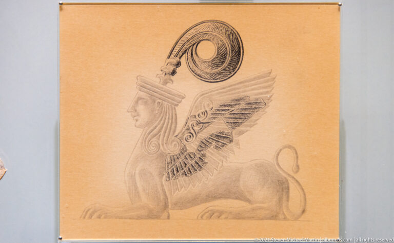 Reconstruction drawing of a winged griffin in profile with feline body, feathered wing, and tall curling crest.