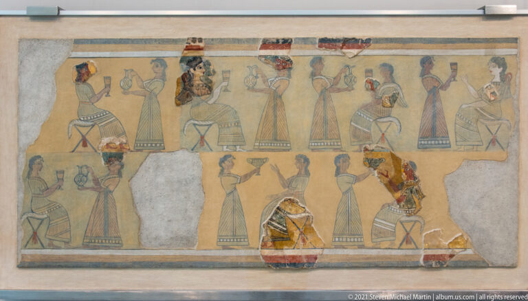 Reconstructed Camp-Stool or Libation Fresco with seated figures on folding stools and standing attendants carrying vessels.