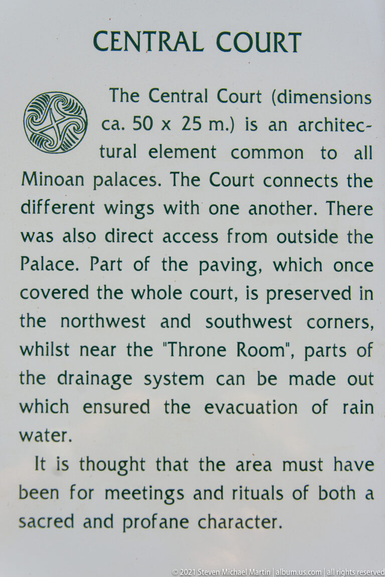 Interpretive panel titled Central Court with text describing the court’s dimensions, access, paving, drainage, and possible ritual use.