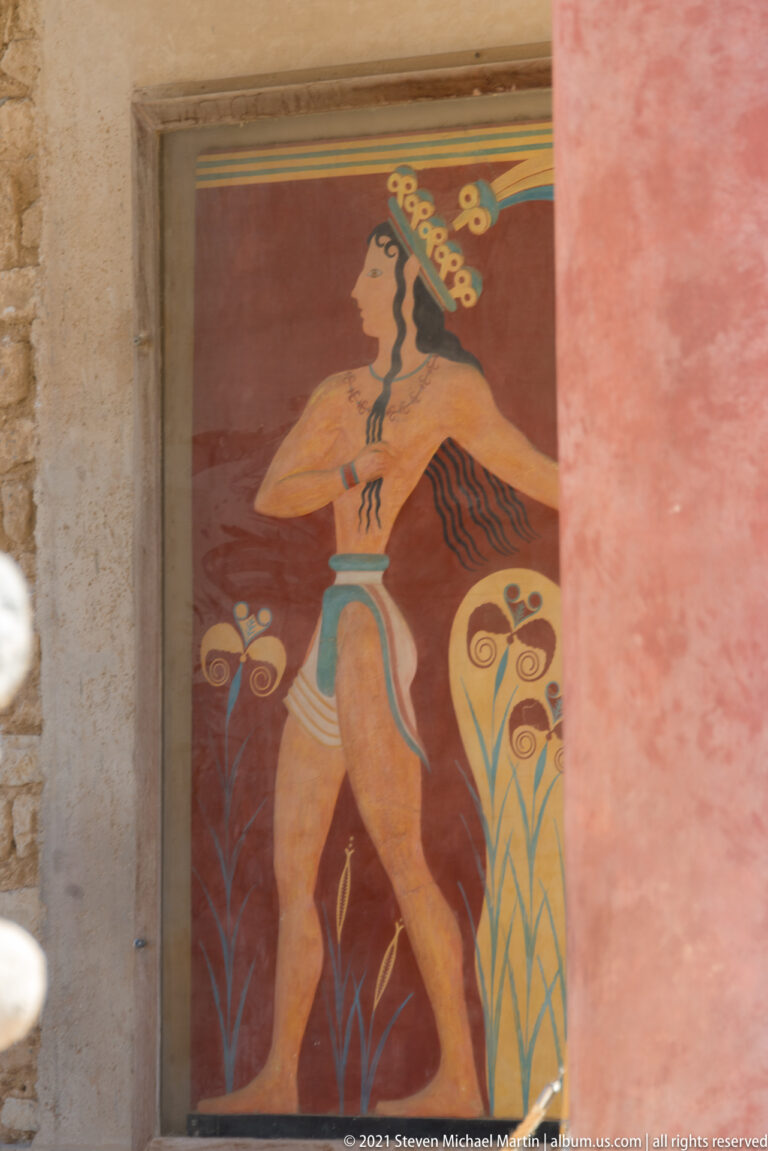 Prince of the Lilies reconstruction showing a striding male figure with elaborate headdress among stylized flowers.