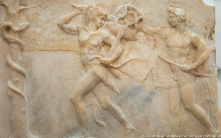 Archaic marble relief with a horse, female figure, and attendant from the Judgment of Paris narrative.