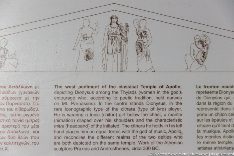 Museum panel with line drawing reconstructing figures across the west pediment of the Temple of Apollo.