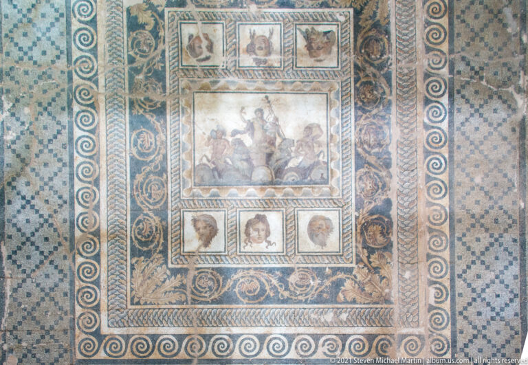 Second-century AD Mosaic of the Epiphany of Dionysus from the Villa of Dionysus, with the god in a panther-drawn chariot and richly patterned borders.