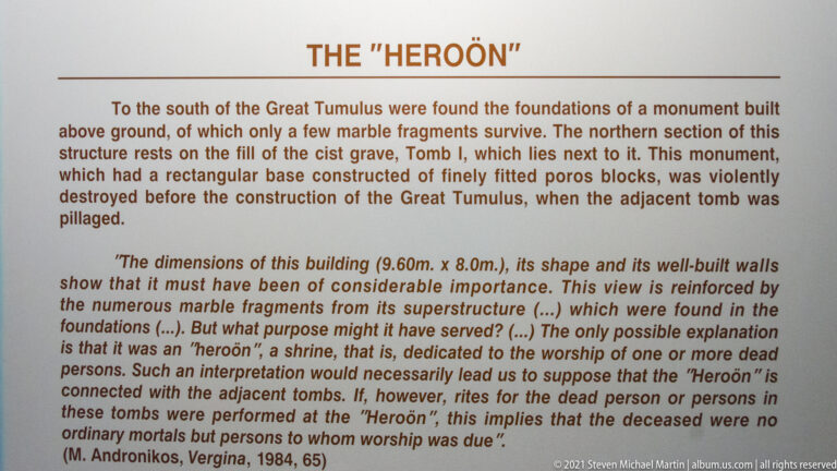 Museum interpretation panel headed “THE HEROÖN,” with text discussing a monument south of the Great Tumulus.