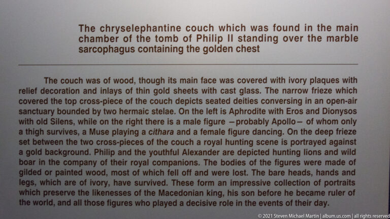 Museum panel explaining the chryselephantine funerary couch from the main chamber of the Tomb of Philip II.