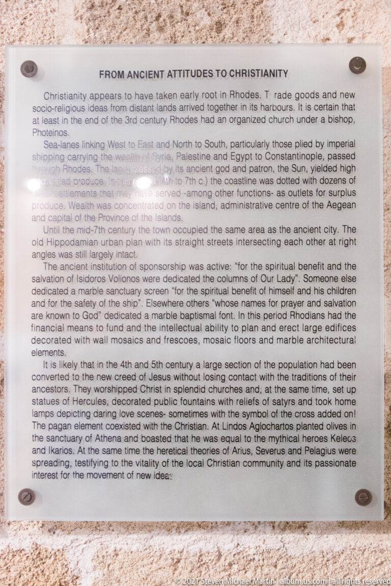 Museum wall panel headed “From Ancient Attitudes to Christianity,” with several paragraphs of explanatory text.