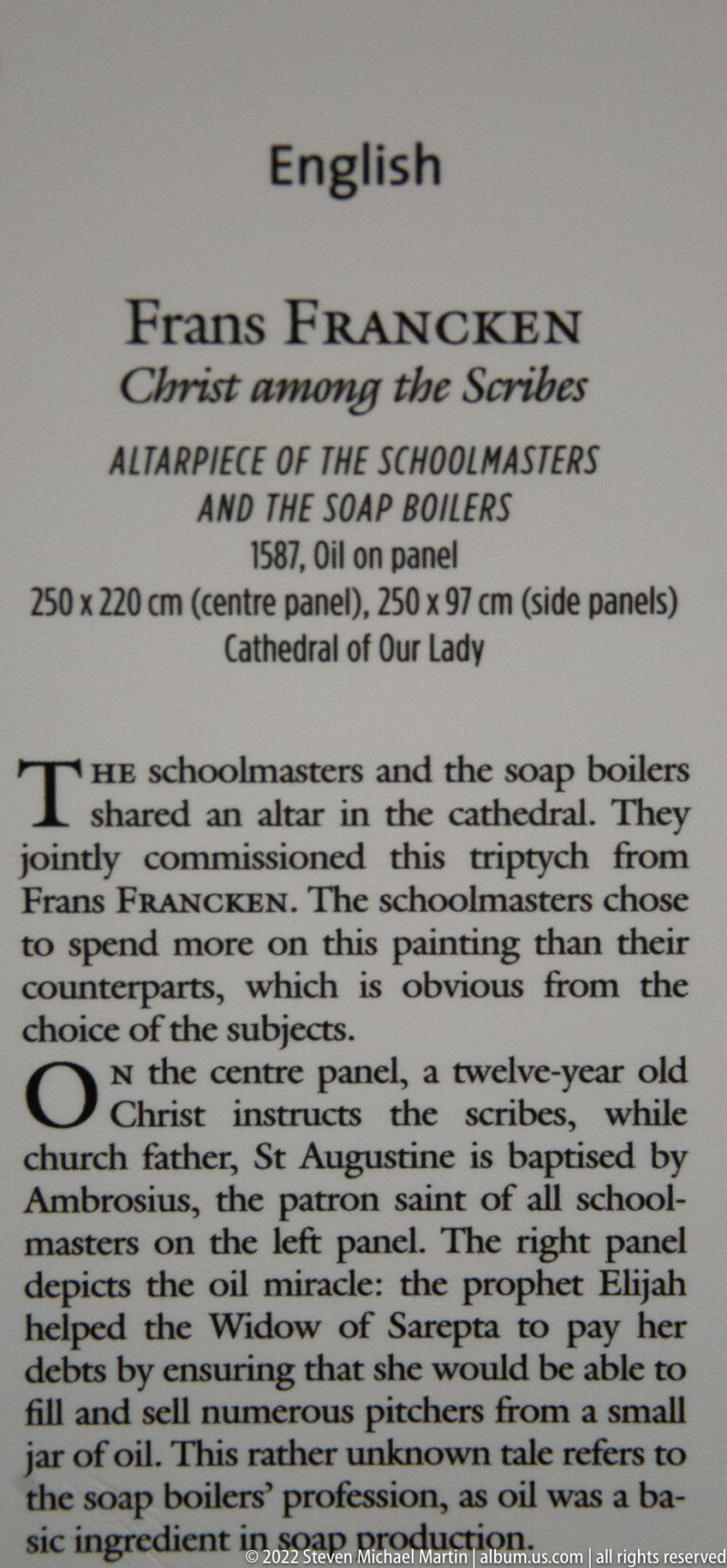 English label naming Frans Francken’s Christ among the Scribes, altarpiece of the Schoolmasters and Soap Boilers, dated 1587.