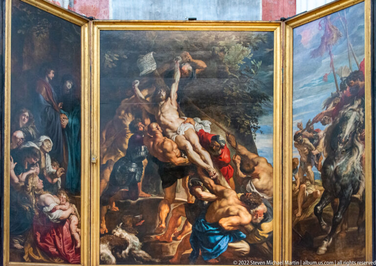 Open Rubens triptych The Elevation of the Cross, with Christ raised on the central cross and narrative scenes on both wings.