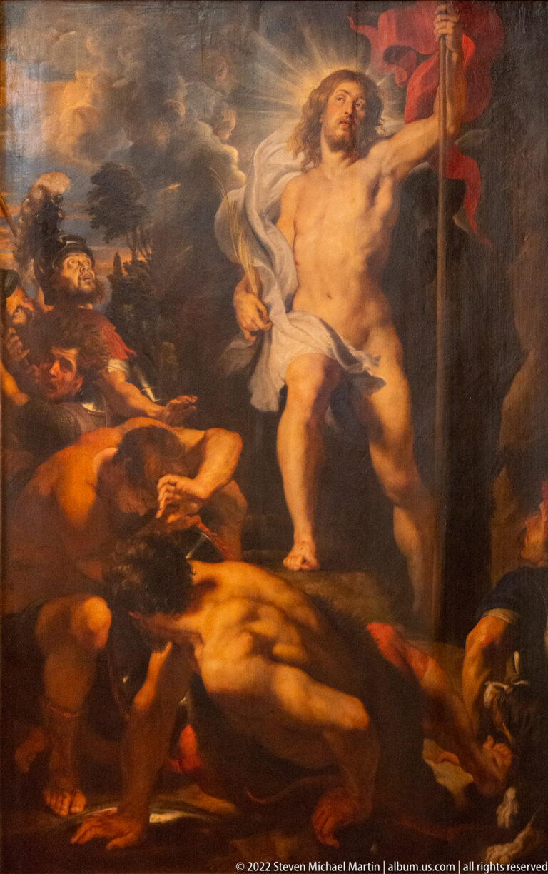 Resurrected Christ holding a red-cross banner above figures gathered around the tomb in a dark dramatic painting.