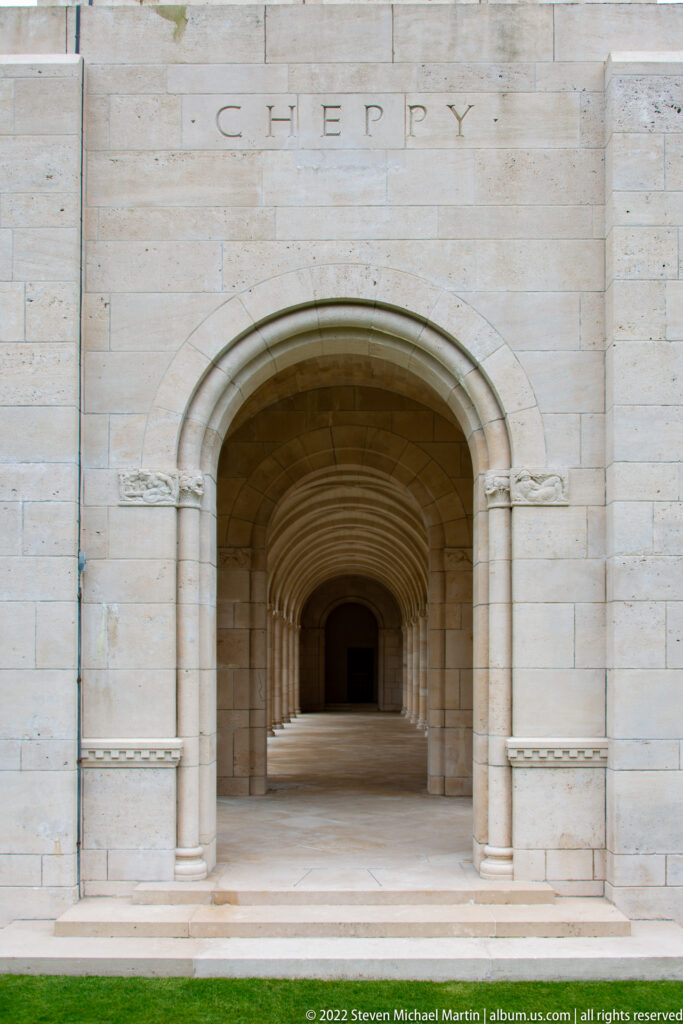 Arched stone entrance labeled Cheppy opens onto a long vaulted arcade receding into shadow.