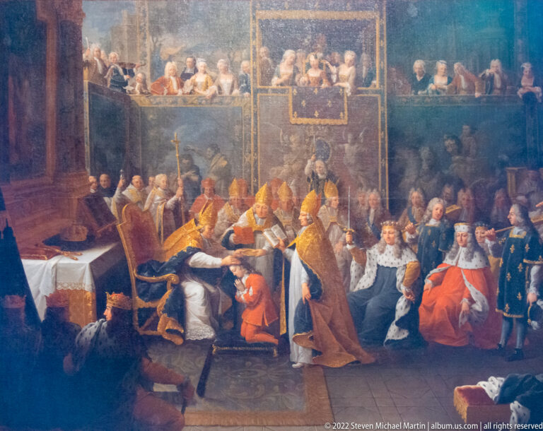 Historical painting of bishops, clergy, and courtiers gathered around a seated figure during a formal indoor ceremony.