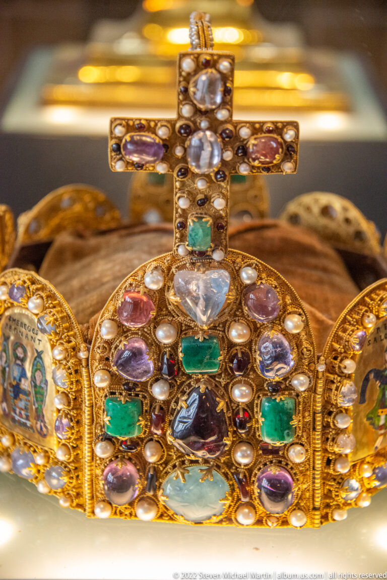 Close view of St. Stephen's Purse replica with jeweled cross, cabochons, pearls, and enamel side panels.