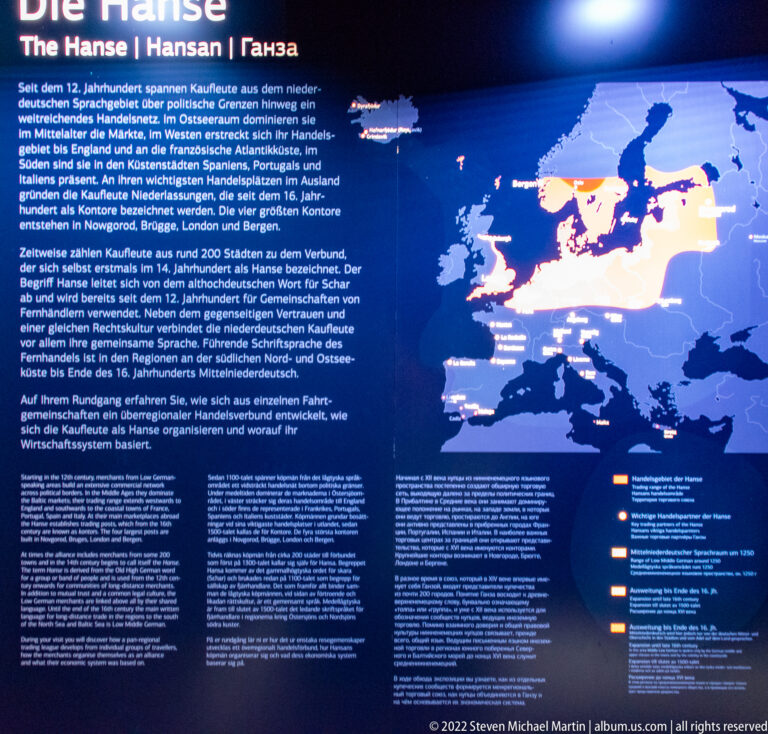 Museum panel about the Hanseatic League with explanatory text and a map of northern Europe.