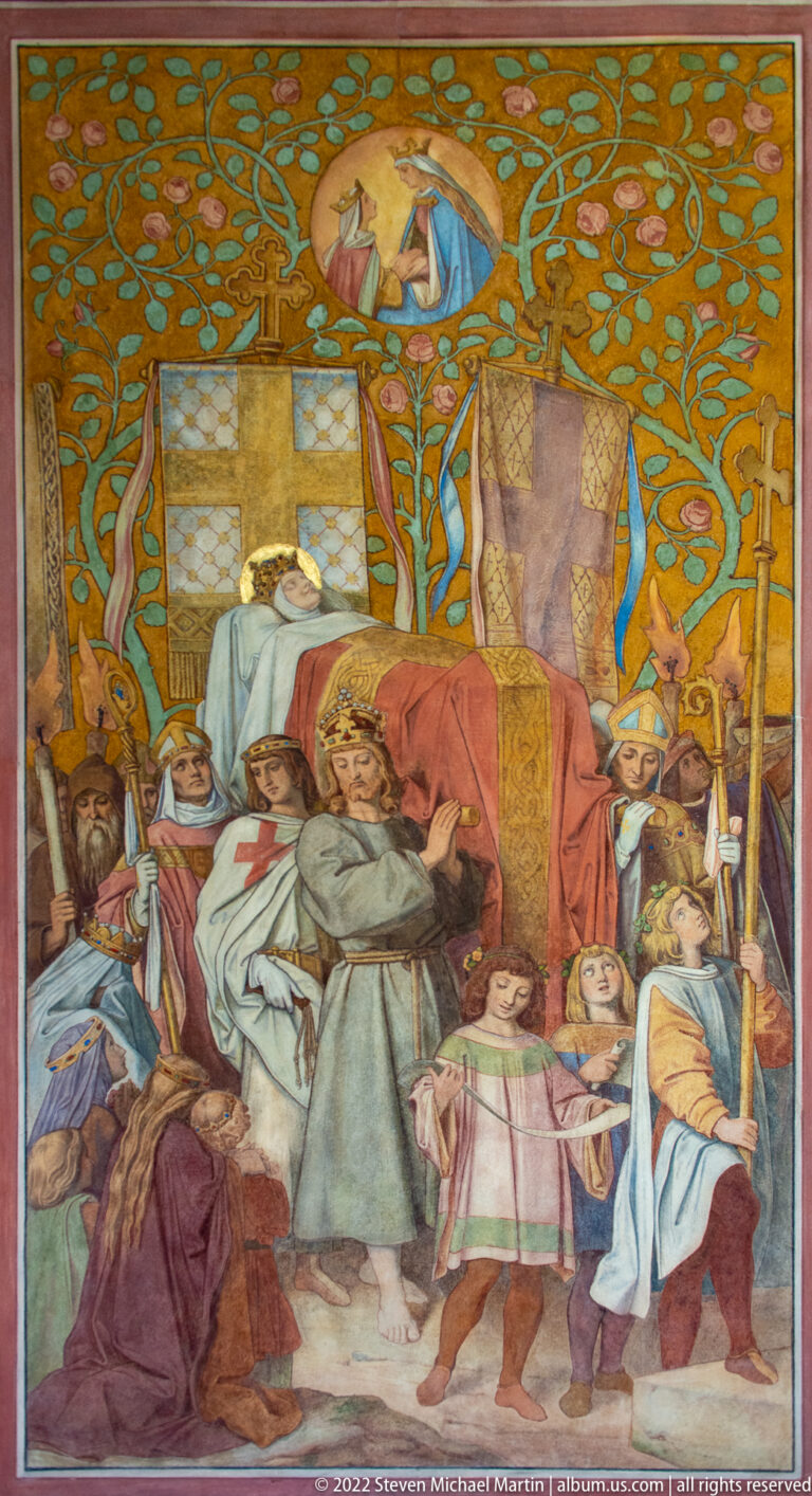 Painted historical scene with children, attendants, heraldic banners, and a small heavenly figure above.