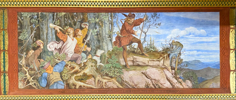 Historical mural of a mounted medieval figure and several companions moving through a rocky wooded landscape.