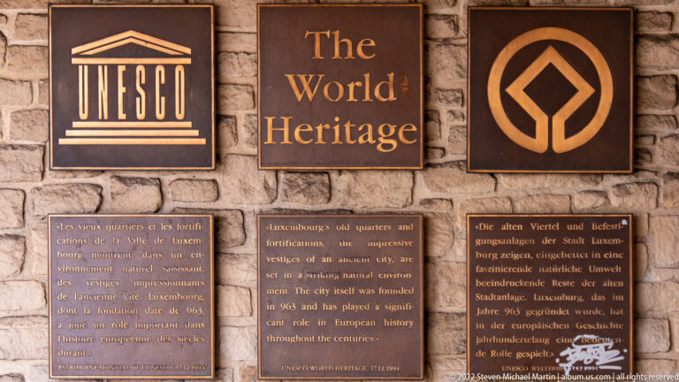 UNESCO and World Heritage plaques identify Luxembourg's old quarters and fortifications in multiple languages.