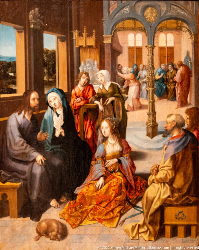 Religious painting with seated and standing figures gathered beneath columns and arches in a richly colored interior.