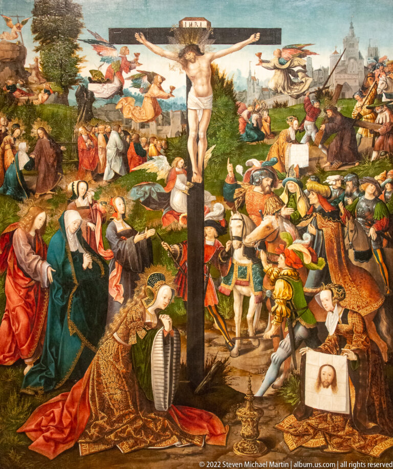Crowded Crucifixion painting with Christ on the cross above mourners, soldiers, clergy, and a distant city landscape.