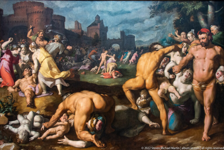 Muscular soldiers attack women and children in a crowded biblical scene with bodies on the ground.