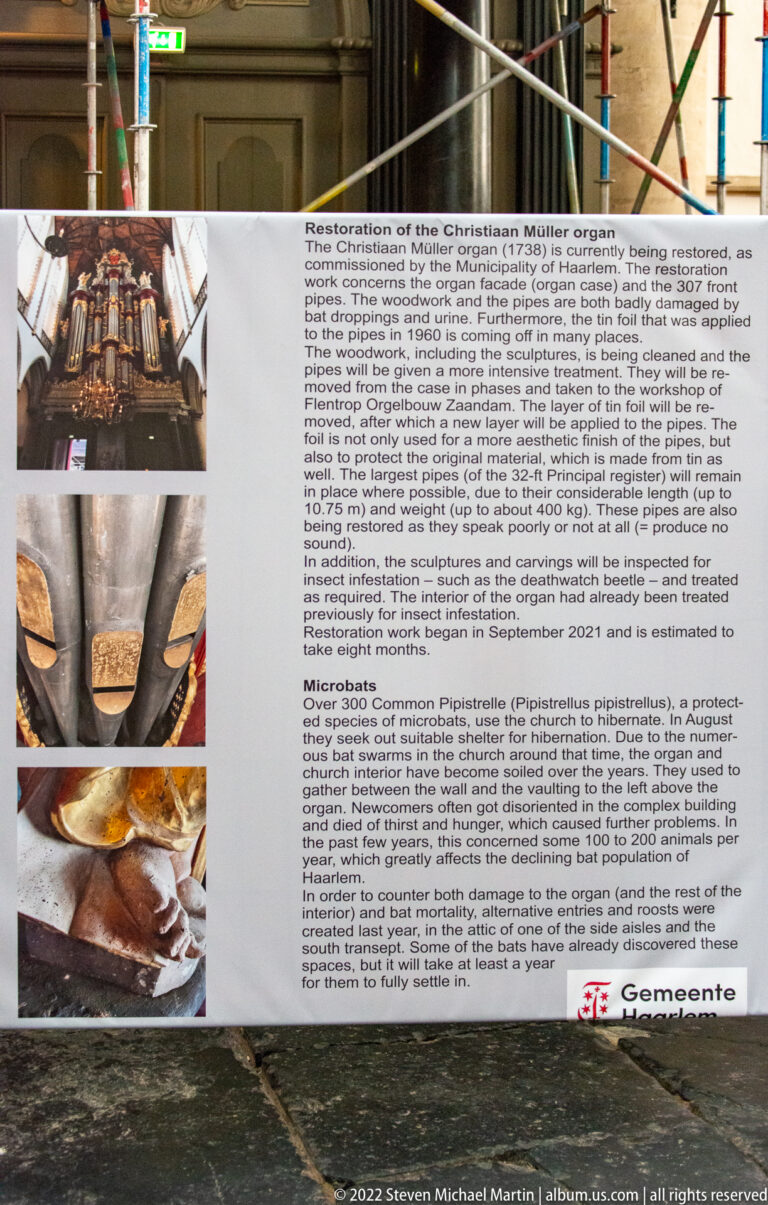 Information panel about restoration of the Christian Müller organ, with text and close-up photographs of organ components.