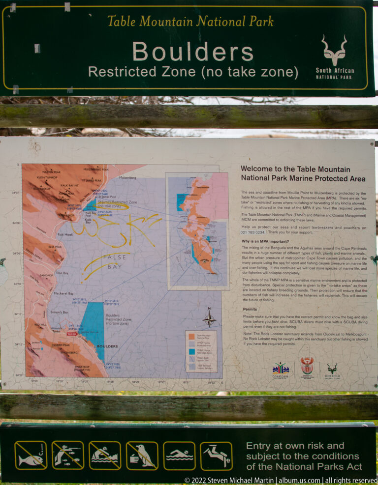 Table Mountain National Park sign for the Boulders restricted no-take zone above a map and marine protected-area information.
