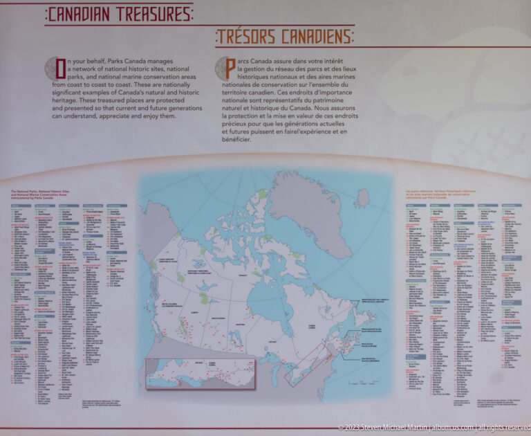 Museum panel with a map of Canada and bilingual lists of Canadian World Heritage sites.