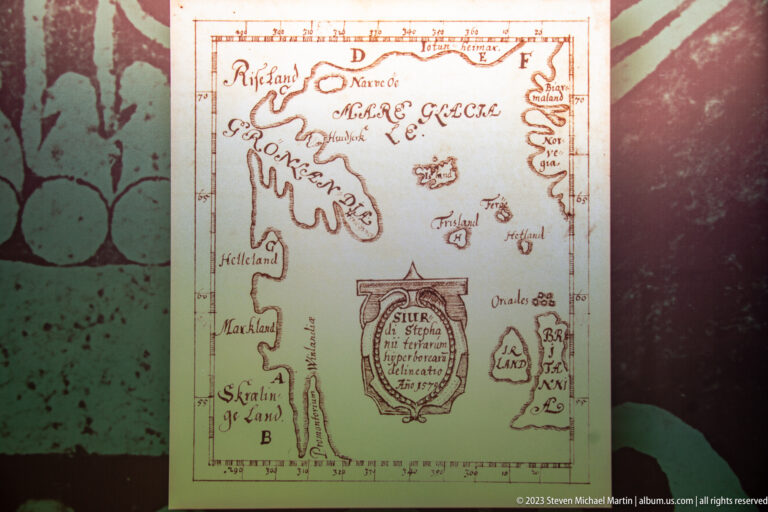 Historic-style map reproduction showing Greenland, Iceland and northeastern North America with handwritten place names.