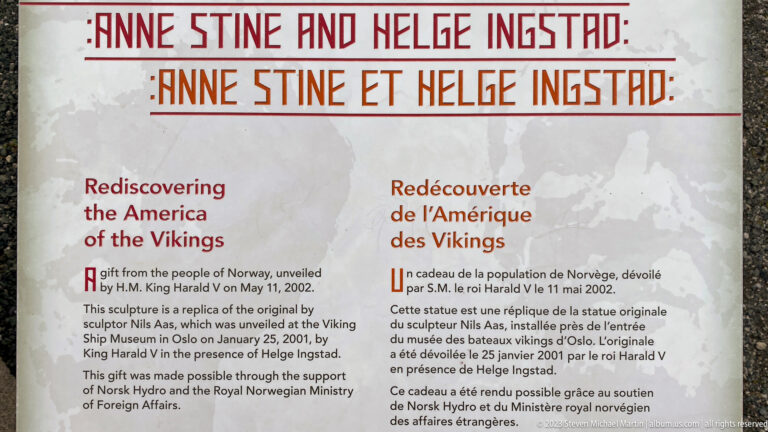 Bilingual interpretive panel headed Anne Stine and Helge Ingstad, describing their role in rediscovering Viking America.